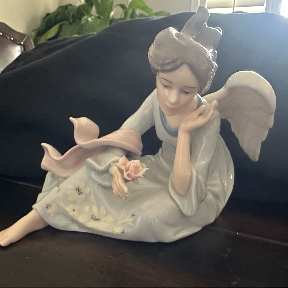 Porcelain Angel Figurine with Pink and Blue Accents